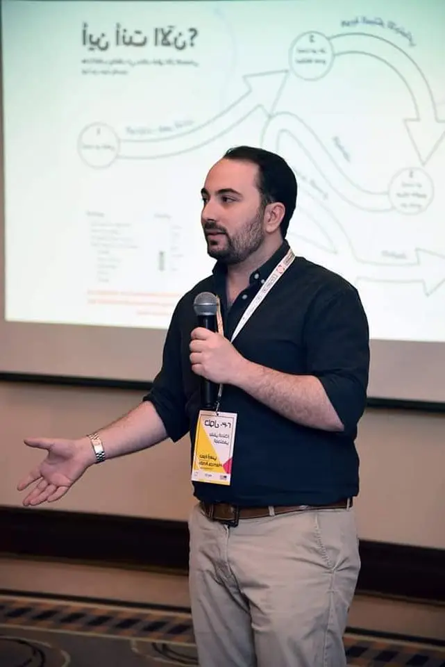 Hamza Arsbi presenting at a policy design workshop